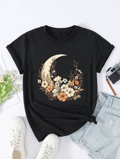 Embrace your curves in style with our Vibrant Moon Floral Plus Size Tee! This casual t-shirt is designed for women with a vibrant floral moon print that adds a touch of whimsy to your look. The comfortable short sleeves and classic round neckline make it a versatile piece for everyday wear. With a slight stretch for flexibility, this tee is perfect for curvy figures looking for both style and comfort. Upgrade your casual wardrobe with this unique and flattering top Casual Spring Tops With Moon Print, Casual Moon Print Tops For Spring, Trendy Spring Tops With Moon Print, Spring Graphic Tee With Moon Print, Spring Moon Print Relaxed Fit T-shirt, Spring Moon Print Relaxed T-shirt, Spring Moon Print Graphic Tee, T Shirt Print Design, T Shirt Ideas