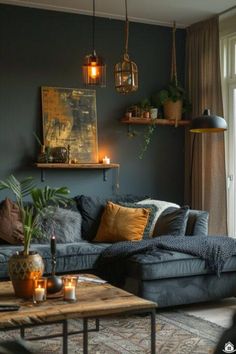 a living room filled with lots of furniture next to a wall mounted shelf full of candles