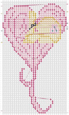 a cross stitch pattern with the shape of a woman's head in pink and yellow