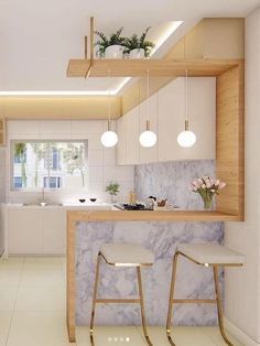 the kitchen is clean and ready to be used as a living room or dining area