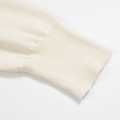 - Knitted polo- 100% cotton yarn- Unlined- Regular fit- Machine washable Fabric & Care- Delicate Machine Wash at 30 degrees(86℉) with similar colors.- Iron inside out on low temperature.- Store flat.- Do not tumble dry.- Do not bleach. Beige Cotton Stretch Sweater, White Stretch V-neck Sweater For Fall, Casual Cream Polo Sweater For Winter, White Long Sleeve V-neck Sweater With Ribbed Cuffs, Stretch White Sweater With Ribbed Collar, White V-neck Sweater With Ribbed Cuffs, White V-neck Sweater With Ribbed Collar, White V-neck Top With Ribbed Cuffs, White Collared Polo Sweater For Fall