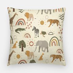 a pillow with animals and rainbows on it