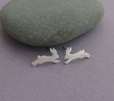 Unique and delicate bunny earrings, sterling silver studs for animal lovers. Minimalist, handmade jewelry for women. Beautiful and cute jumping rabbits stud earrings. These unique earrings are 100% handmade by me. I saw the rabbit figures by hand from a durable, solid sterling silver sheet, file it, solder the silver posts, and give them a matte or shiny finish. These minimalist earrings will compliment women of all ages. They can make a great gift for animal lovers and will become an instant fa Bunny Earring, Rabbit Earrings, Minimalist Earring, Small Stud Earrings, Bunny Earrings, Silver Cat, Animal Earrings, Sterling Silver Stud Earrings, Small Earrings Studs