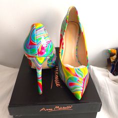 Colorful 4" Pointed Toe Stilleto Heel Swirls Of Colors Make It A Must Have. Patent Leather Colorful Pointed Toe Heels For Party, Multicolor 4-inch Heel Closed Toe Heels, Multicolor Closed Toe Heels With 4-inch Heel, Trendy Multicolor Wrapped Heel, Vibrant Colorful High Heels, Multicolor Pointed Toe Heels With Wrapped Heel, Colorful Trendy Pointed Toe Heels, Vibrant Multicolor High Heels, Rainbow Pointed Toe Heels