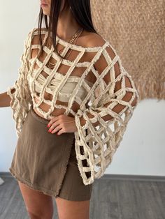 Enhance your summer wardrobe with our Crochet Top Pattern, beautifully designed for the fashion-forward woman. This cotton summer top, available as a chic crop top or a cozy long-sleeve crochet sweater, is perfect for beach days or casual outings. Each piece showcases intricate crochet work that adds a touch of artisanal charm to any outfit. Whether you're gifting it or treating yourself, this versatile crochet top is a stylish choice that combines comfort with feminine elegance. Key Features ✨ Cheap Crochet Tops For Women, Luxury Casual Crochet Top For Summer, Luxury Cotton Crochet Top, Luxury Summer Crochet Top For Beach, Luxury Crochet Top For Women For Party, Luxury Fitted Elegant Crochet Top, Luxury Summer Crochet Top With Crochet Trim, Luxury Crochet Top For Spring, Luxury Summer Knit Crochet Top