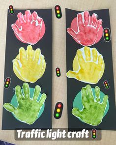 three hand prints on black paper with the words traffic light craft