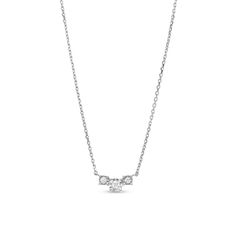 Dainty yet dazzling, this diamond necklace is a great look any time. 10K white gold The cable chain necklace is centered with a trio of shimmering diamonds, each set to enhance size and sparkle 1/10 ct. t.w. of diamonds 18.0-inch adjustable necklace; lobster claw clasp Fine Jewelry White Gold Three Stone Diamond Necklace, White Gold Three Stone Diamond Necklace, Formal White Gold Three Stone Necklace, Classic Three Stone Diamond Necklace In White Gold, Silver Three Stone Diamond Necklace In Fine Jewelry Style, Silver Three Stone Diamond Necklace, Silver Three Stone Necklace In Fine Jewelry Style, Silver Three Stone Necklace, Fine Jewelry Style, White Gold Three Stone Round Cut Diamond Necklace