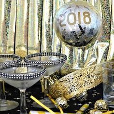 new year's eve party decorations with champagne and confetti