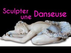 a statue with the words sculpter une danceuse on it's side