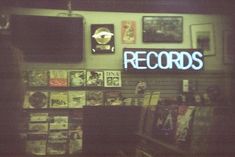 the record shop has records on the wall