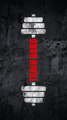 a red and white poster with some type of object in the middle, on a black background