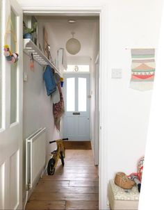 the hallway is clean and ready to be used as a child's playroom