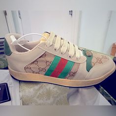 Gucci Tricolor Sneakers (Green And Red Stripe With Gold Emblem) Beautiful Shoes! Sporty Green Gucci Sneakers, Gucci Green Sneakers With Rubber Sole, Gucci Green Lace-up Sneakers, Gucci Custom Sneakers With Round Toe And Laces, Gucci Casual Custom Sneakers, Gucci Casual Custom Sneakers With Round Toe, Gucci Sporty Sneakers With Red Sole, Gucci Shoes Women, Disney Sneakers