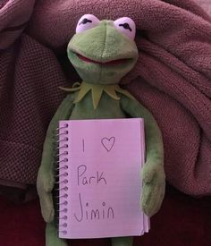 a stuffed animal holding a note that says i love pack jimmy