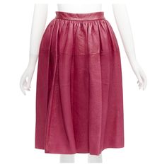 MIU MIU raspberry pink lambskin leather high waist panelled table skirt IT40 S Reference: BSHW/A00042 Brand: Miu Miu Designer: Miuccia Prada Material: Lambskin Leather Color: Pink Pattern: Solid Closure: Zip Lining: Pink Fabric Extra Details: Side zip. Made in: Italy CONDITION: Condition: Excellent, this item was pre-owned and is in excellent condition. This piece is still in its beautiful condition, ready to be loved. Comes with: Style code present (Generic) SIZING Designer size: IT40 Size refe Traditional Chic, Female Mannequin, Zip Lining, Versace Gold, Tweed Pencil Skirt, Table Skirt, Draped Skirt, Raspberry Pink, Women Skirts