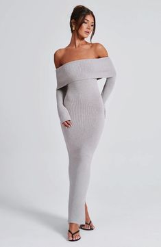 Lightweight knits are THAT girl. We adore our soft. pretty Beverley maxi. made in premium knit that hugs your body like a glove. Featuring off the shoulder styling with a wide bardot fold over panel. long fitted sleeves which flare at the cuff and a small split to the back skirt. pair yours with effortless. loose waves and gold jewellery.   Colour: Light grey marl. Premium knit fabric. Off the shoulder styling. Wide bardot panel. Long fitted sleeves with slightly flared cuffs. Split to centre back of the skirt. Moulds to body figure. Maxi length. Model is an XS and is wearing an XS. Homecoming Dresses Corset, Midi Dress Wedding Guest, Long Sleeve Homecoming Dresses, Split Long Dress, Homecoming Dresses Long, Angel Dress, Fitted Sleeves, Body Figure, Maxi Dress Sale