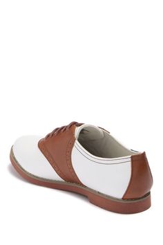 Bring preppy and chic together with a colorblocked leather saddle shoe that will instantly elevate any outfit.M=standard width Retro Brogue Oxfords With Round Toe, Retro Oxfords With Brogue Detailing And Round Toe, Retro Oxfords With Brogue Detailing For Work, Retro Brogue Oxfords For Work, Retro Oxfords With Rubber Sole For Work, Classic White Cap Toe Oxfords, Retro Low-top Oxfords With Leather Sole, Retro Oxfords With Leather Sole For Work, Oxfords With Contrast Sole And Round Toe