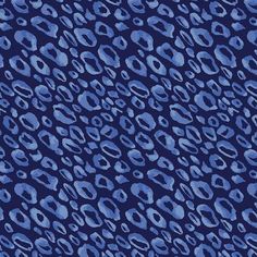 an animal print pattern in blue on a dark background with white and black spots,