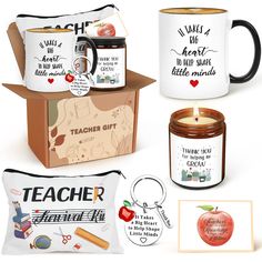 the teacher appreciation gift set includes two mugs, an apple and a note card