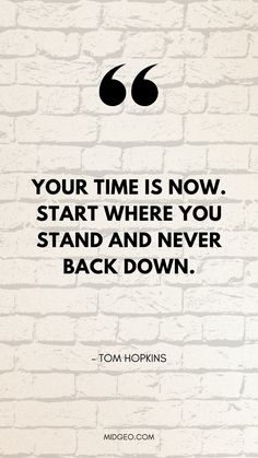 a brick wall with a quote on it that says, your time is now start where you