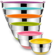 four different colored bowls stacked on top of each other