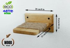 a wooden bed frame with measurements for the headboard