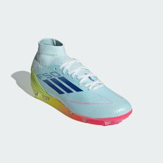 the adidas soccer shoe is shown in blue, yellow and pink colors on a white background