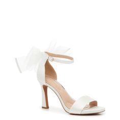 Show off your graceful look with these women's Kelly & Katie Nemira white evening sandals. Crafted from fabric and synthetic upper, these high heel evening sandals are styled with a round open toe and an adjustable ankle strap with buckle closure for a secure. The beautiful bow accent at the heel counter adds elegance and femininity. A synthetic lining and padded footbed provide comfort while chunky block heel and fabric-flocked synthetic sole offer enhanced elegance and stability. This style is Open Toe Bridal Shoes, Bridesmaid Heels, Bridesmaids Heels, Heels White, Evening Sandals, Chunky Block Heels, White Heels, Wedding Heels, Bride Shoes