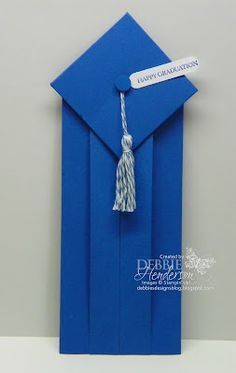 a blue graduation cap with a tassel hanging from it