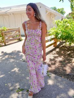 Step into luxury with the Olina Floral Maxi Dress by ASTR. This ethereal dress features delicate ruffled spaghetti straps and a smocked back for a perfect fit. The gathered bust and tiered, chiffon fabric create a flowy silhouette, perfect for any wedding guest or dressy occasion. Elevate your style with this exclusive and elegant purple floral dress. Floral ruffle maxi dress Adjustable straps Boning on sides of bust Smocked elastic back Fully lined Self: 100% Polyester / Lining: 96% Polyester, Purple Floral Bridesmaid Dresses, Floral Bridesmaid Dresses, Ethereal Dress, Purple Floral Dress, Ruffle Maxi Dress, Pink Floral Dress, Ruffled Maxi Dress, Floral Ruffle, Purple Wedding