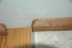 the corner of a room with wood trim