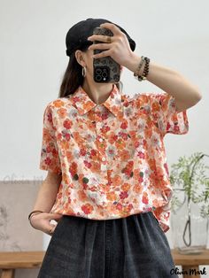 Olivia Mark - Floral Print Short-Sleeve Shirt: Sweet and Loose-Fit, with Half-Open Lapel Design Orange Collared Tops For Summer, Orange Button-up Tops For Summer, Orange Button-up Summer Top, Summer Orange Button-up Top, Orange Collared Summer Blouse, Casual Floral Print Relaxed Fit Blouse, Casual Relaxed Fit Floral Print Blouse, Orange Floral Print Casual Shirt, Orange Printed Short Sleeve Tops