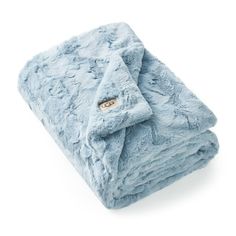 a blue blanket folded on top of each other