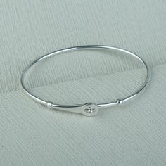 Discover the timeless elegance of our 925 sterling silver men's cuff bracelet, a masterful blend of rugged durability and sophisticated design. Handcrafted with meticulous attention to detail, this bracelet embodies a sleek, minimalist aesthetic that complements both casual and formal attire. Its robust construction ensures lasting strength while maintaining a refined edge, making it a versatile accessory for the modern man. Enhance your connection with a partner through our elegant matching bracelets, designed to offer a seamless blend of style and sentiment. Each bracelet features a simple yet striking design, crafted from the same high-quality silver and attention to detail as our men's cuff bracelet. The minimalist design creates a harmonious look for couples who appreciate subtle, ref Silver Friendship Bracelets, Mens Cuff Bracelets, Mens Cuff, Bracelet Mens, Couples Gift, Sterling Silver Mens, Formal Attire, Sophisticated Design, Minimalist Aesthetic