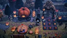 a halloween scene with pumpkins, jack - o'- lanternes and other decorations