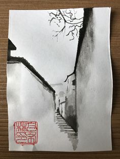 a piece of paper with a drawing of a house and stairs on the side of it