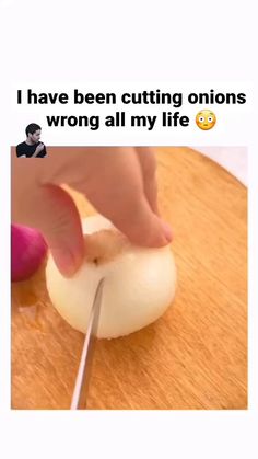 someone cutting an onion with a knife on top of it that says i have been cutting onions wrong all my life