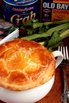 a pot pie sitting on top of a wooden table