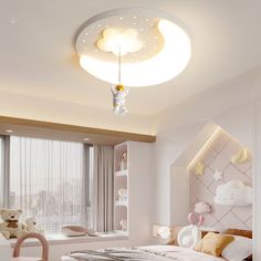 a child's bedroom decorated in pink and white