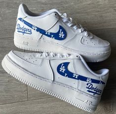 Hand-painted LA Dodgers custom AF1. Painted with water-resistant and non-cracking leather paint. Every shoe used is 100% authentic. Sizing details Air Force 1's run big, so we recommend that customers choose a half size down from their usual size. Custom Leather Sneakers For Sports, Customizable Leather Sporty Sneakers, Customizable Leather Sneakers, Customizable Leather Sneakers For Sports, Casual Leather Custom Sneakers With Waterproofing, Custom Lace-up Leather Sneakers With Waterproof Paint, Waterproof Leather Custom Sneakers Lace-up, Sporty Custom Leather Sneakers With Waterproof Paint, La Dodgers Baseball