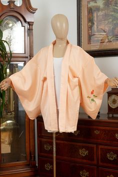 SIZE: Vertical Length: 76 cm (Collar Seam to Hem) Horizontal Length: 66 cm (Sleeve to Center Back Seam) Sleeve Depth: 45 cm (Sleeve Top to Bottom) Torso Width: 62 cm (Armpit to Armpit) FABRIC: Silk GAUGE: Medium TEXTURE: Soft CONDITION: Excellent BLEMISHES: None Observed Haori jacket works not only for traditional Kimono wearing but also for modern vintage-style fashion suitable for both the casual and formal occasions. Due to the nature of being a vintage textile product, the item might come with partial wrinkles, fold lines and stains. Most of such conditions are either depicted in the gallery photos or otherwise illustrated within the product descriptions. Please keep in mind that, though I try my honest best in reporting any blemishes, it is impossible to locate and present every singl Traditional Outerwear For Spring Tea Ceremony, Spring Cotton Kimono For Tea Ceremony, Vintage Cotton Kimono For Spring, Long Sleeve Outerwear For Fall Tea Ceremony, Japanese Haori, Haori Jacket, Luxury Textiles, Chino Hills, Traditional Kimono