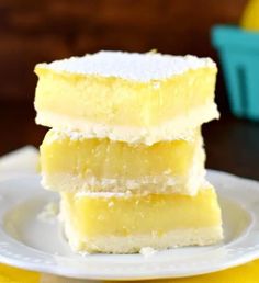 three pieces of cake sitting on top of a white plate