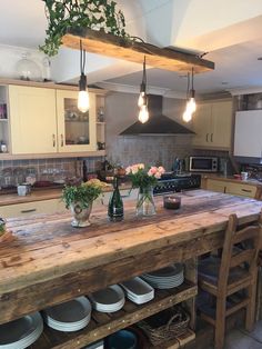 a kitchen island with pots and pans on it