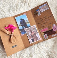 an open book with pictures and flowers on it