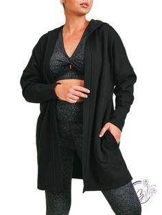 Keep yourself warm (and stylish) in this open-front cardigan. With its longline silhouette, hoodie, long sleeves with thumb holes, and luxurious fleece inner lining, this cardigan is your go-to for when temperature drops. Model in Brick is 5'7", a size 16, and is wearing a 1XL. Fabric: 68.5% polyester, 28.5% cotton, 3% spandex. Comfortable Outerwear For Loungewear, Comfortable Loungewear Outerwear, Comfortable Loungewear Outerwear With Ribbed Cuffs, Comfy Fall Outerwear For Loungewear, Cozy Snug Outerwear For Loungewear, Snug Cozy Loungewear Outerwear, Snug Long Sleeve Cardigan For Fall, Snug Long Sleeve Fall Cardigan, Comfortable Long Sleeve Cardigan For Layering