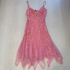 Betsey Johnson Evening Dress It's Sparkly Pink And Beautiful In Excellent Condition. It Was Only Worn Once For A Wedding And Has Been In A Protective Bag. - Size 10 - Adjustable Spaghetti Straps And Hidden Side Zipper - It Has A Mesh Net And Pink Sequin Overlay - Adorned With Tiers Of Decadently Ruffled Tulle - Has A Little Stretch T Is Approx. 48 Inches Long And 16 Inches Flat Where The Bust Line Is. Perfect For Formal Event The Pictures Don't Do It Justice #Betseyjohnson #Valentines Pink Sequin Dress, Betsey Johnson Dresses, Pink Sequin, Sequin Dress, Formal Event, Betsey Johnson, Evening Dress, Side Zipper, Spaghetti Strap