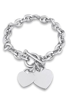 Double heart charms adorn an elegant oval-link bracelet finished in gleaming silvertone plate. Toggle clasp Brass/silvertone plate Imported Diamond Bar Necklace, Silver Heart Bracelet, Better Things, Girly Accessories, Diamond Bar, Toggle Bracelet, Jewelry Lookbook, Accessories Ideas, Silver Charm Bracelet