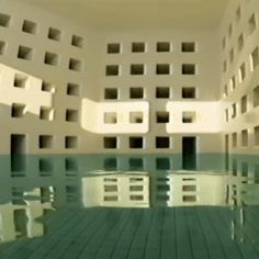 an indoor swimming pool with water reflecting off the floor and windows on the wall above it