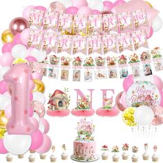 a pink first birthday party with balloons and decorations