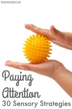 a hand holding a yellow ball with the words paying attention to 30 sensory strategies